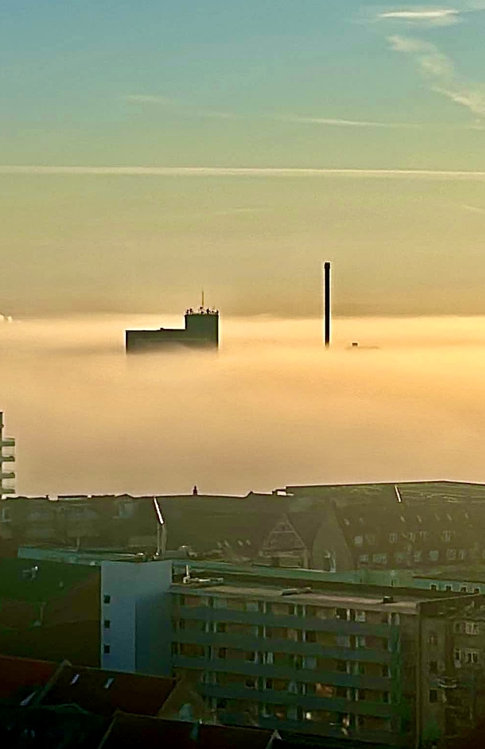 Tåge over byen